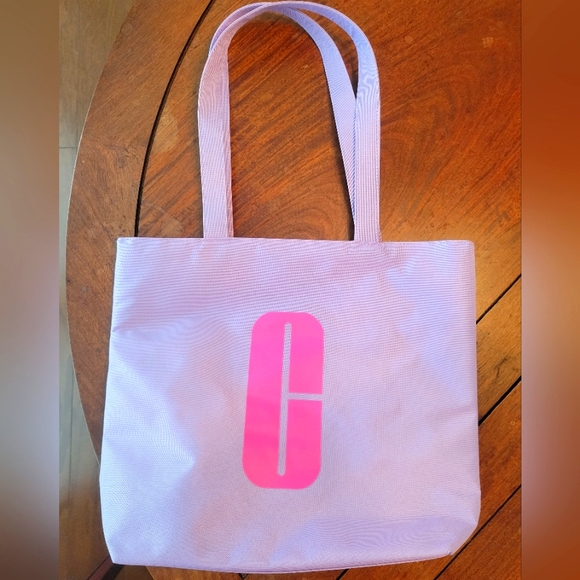 Clinique Handbags - Lavender Clinique reversible tote NWOT